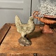 Vintage garden statue of a perky little rooster