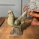 Vintage garden statue of a perky little rooster