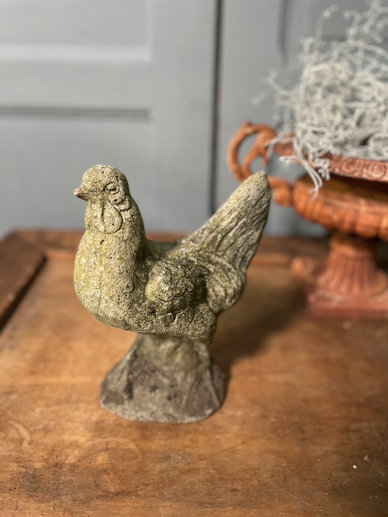 Vintage garden statue of a perky little rooster