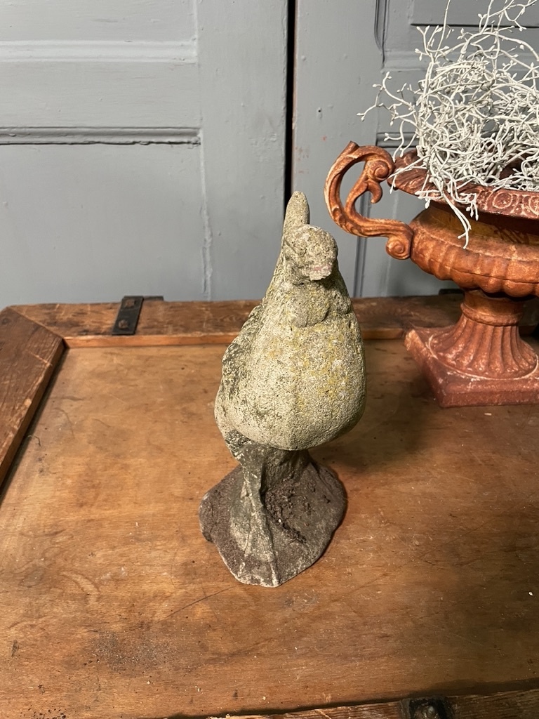 Vintage garden statue of a perky little rooster