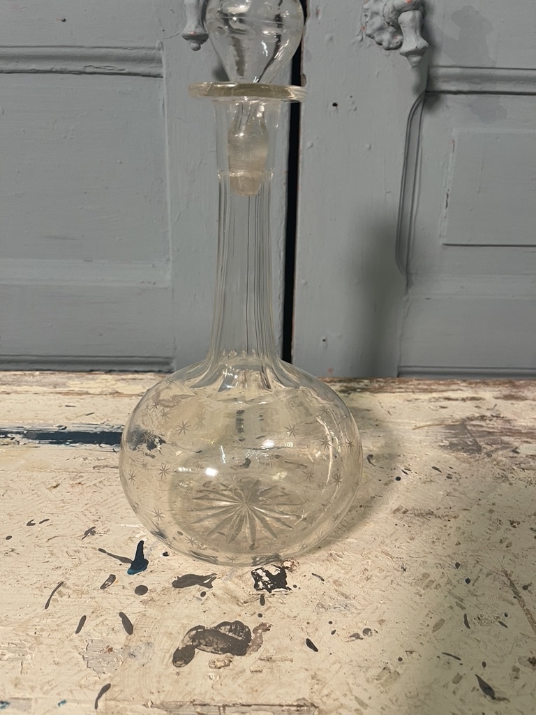 Old decanter engraved with little stars