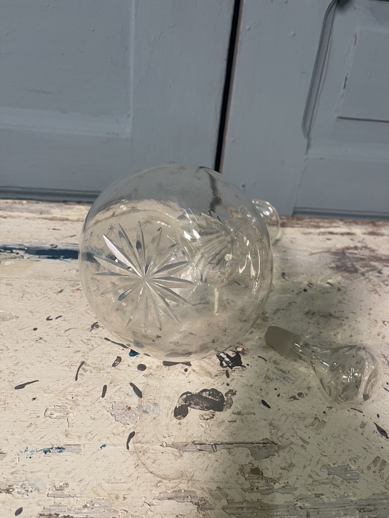 Old decanter engraved with little stars