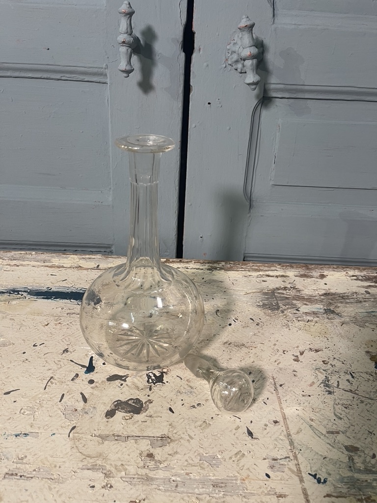 Old decanter engraved with little stars