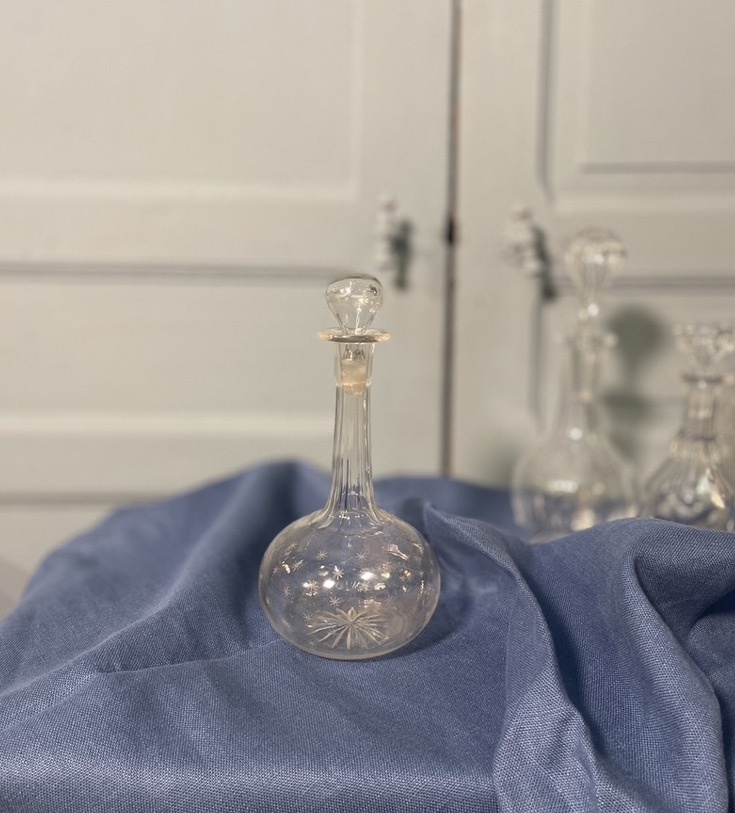 Old decanter engraved with little stars