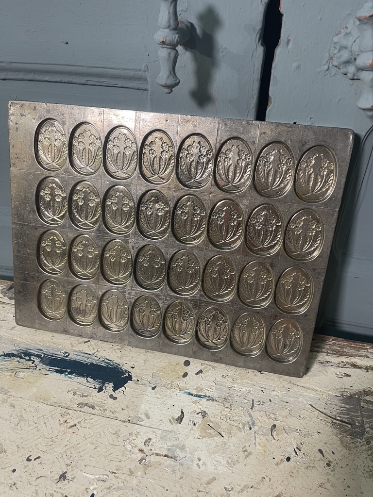 Antique chocolate mold with summer flowers