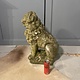 Almost antique garden statue, sitting lion