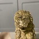 Almost antique garden statue, sitting lion