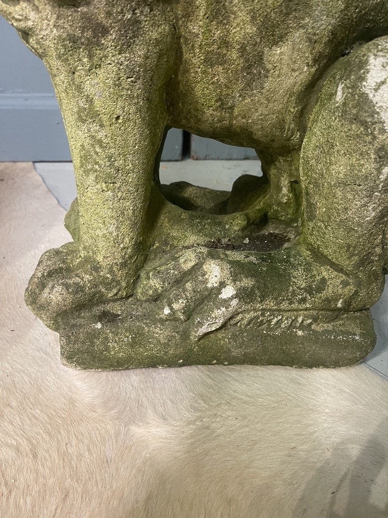 Almost antique garden statue, sitting lion