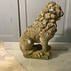 Almost antique garden statue, sitting lion