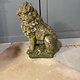Almost antique garden statue, sitting lion