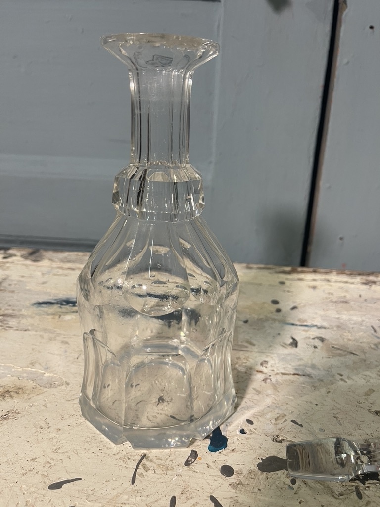 Antique decanter with panel cut
