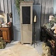 Antique  tall slim one-door cabinet
