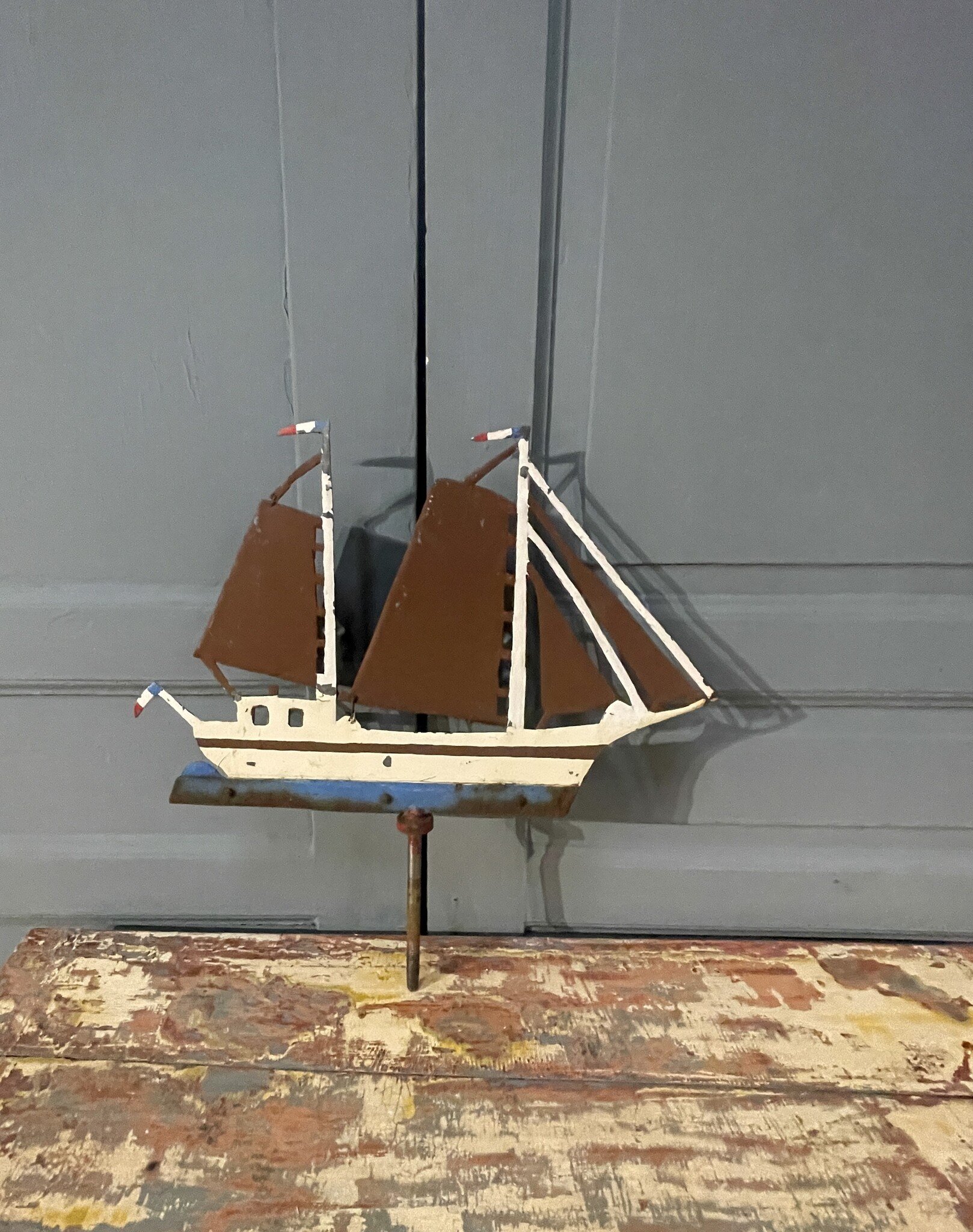 Old weather vane, sailboat
