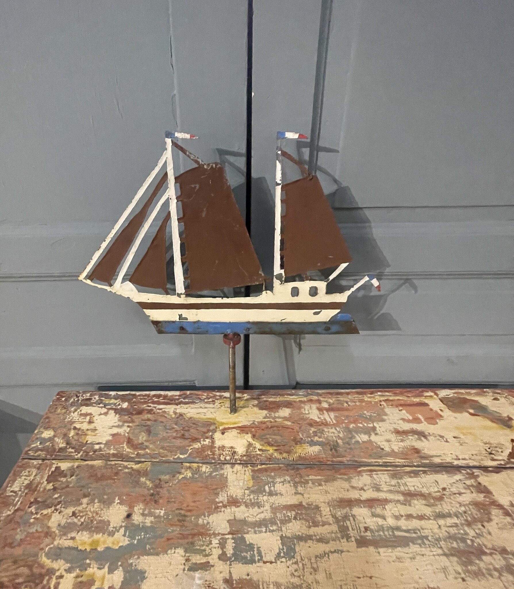 Old weather vane, sailboat