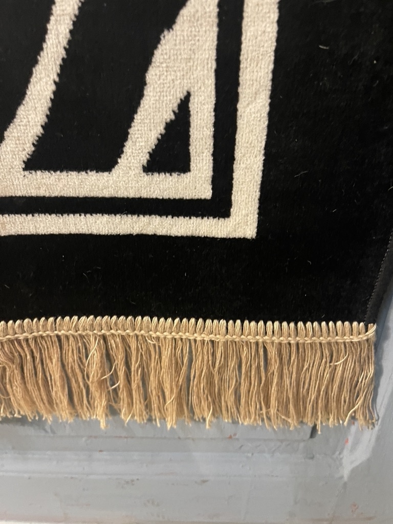 Zebra rug with fringe