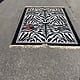 Zebra rug with fringe