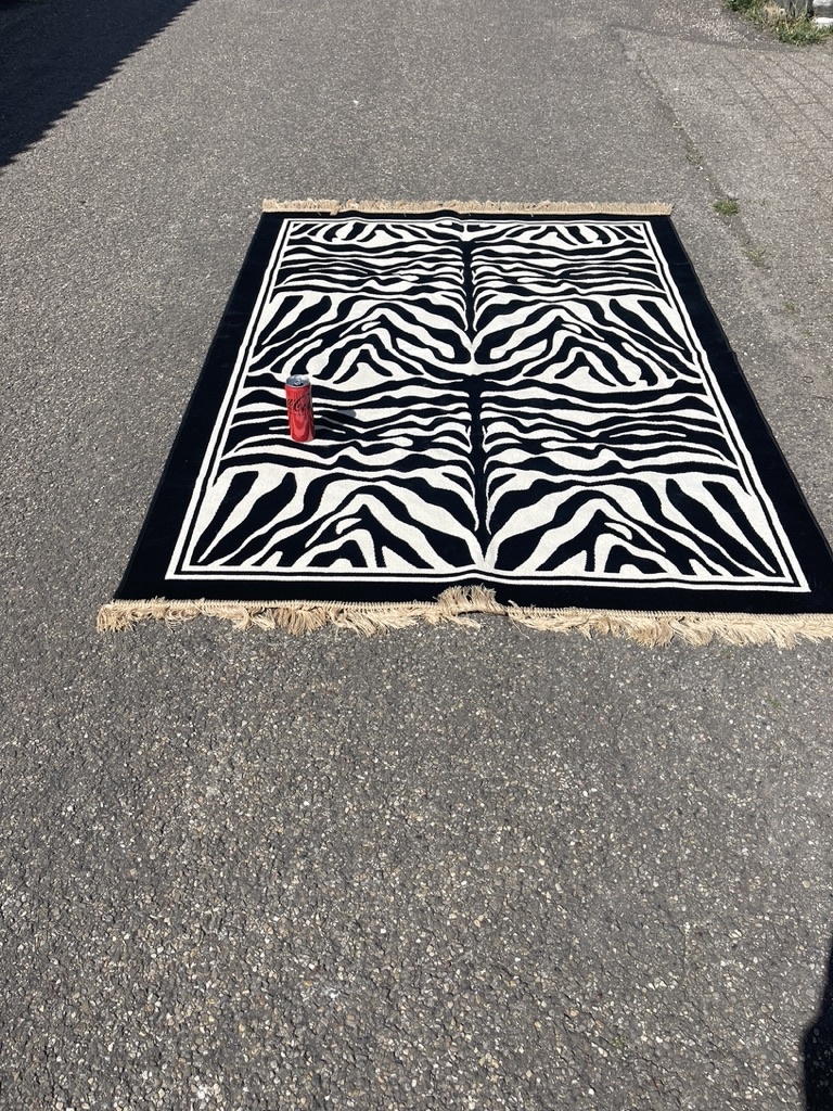 Zebra rug with fringe