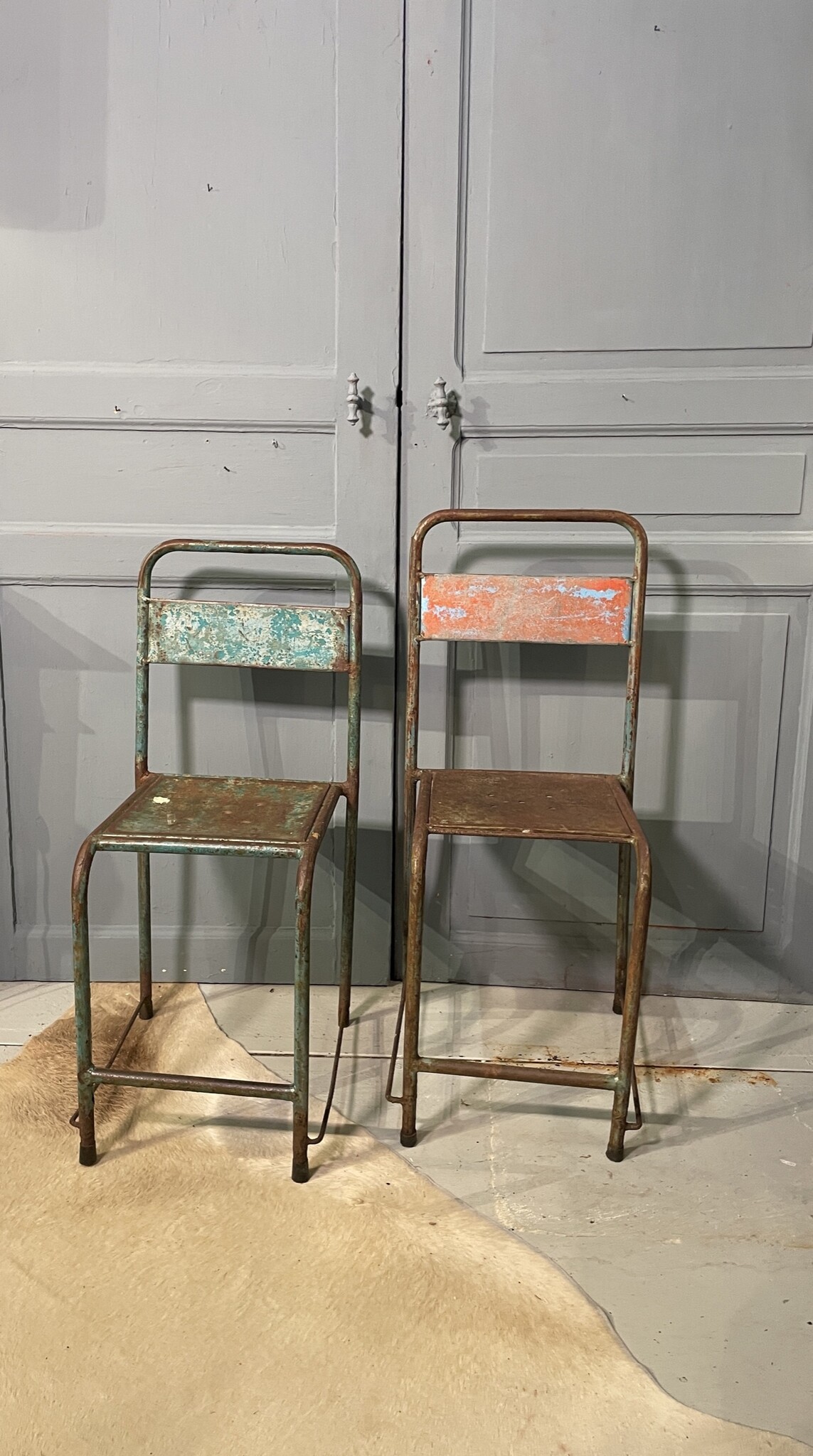 Set of 4 iron terrace chairs, each different