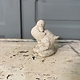 Sweet garden statue of a shy little duck