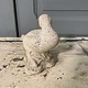 Sweet garden statue of a shy little duck