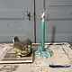 Handcrafted ceramic candle holder made from a wall iron
