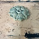 Handcrafted ceramic candle holder made from a wall iron