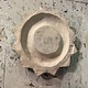 Handcrafted ceramic candle holder made from a wall iron