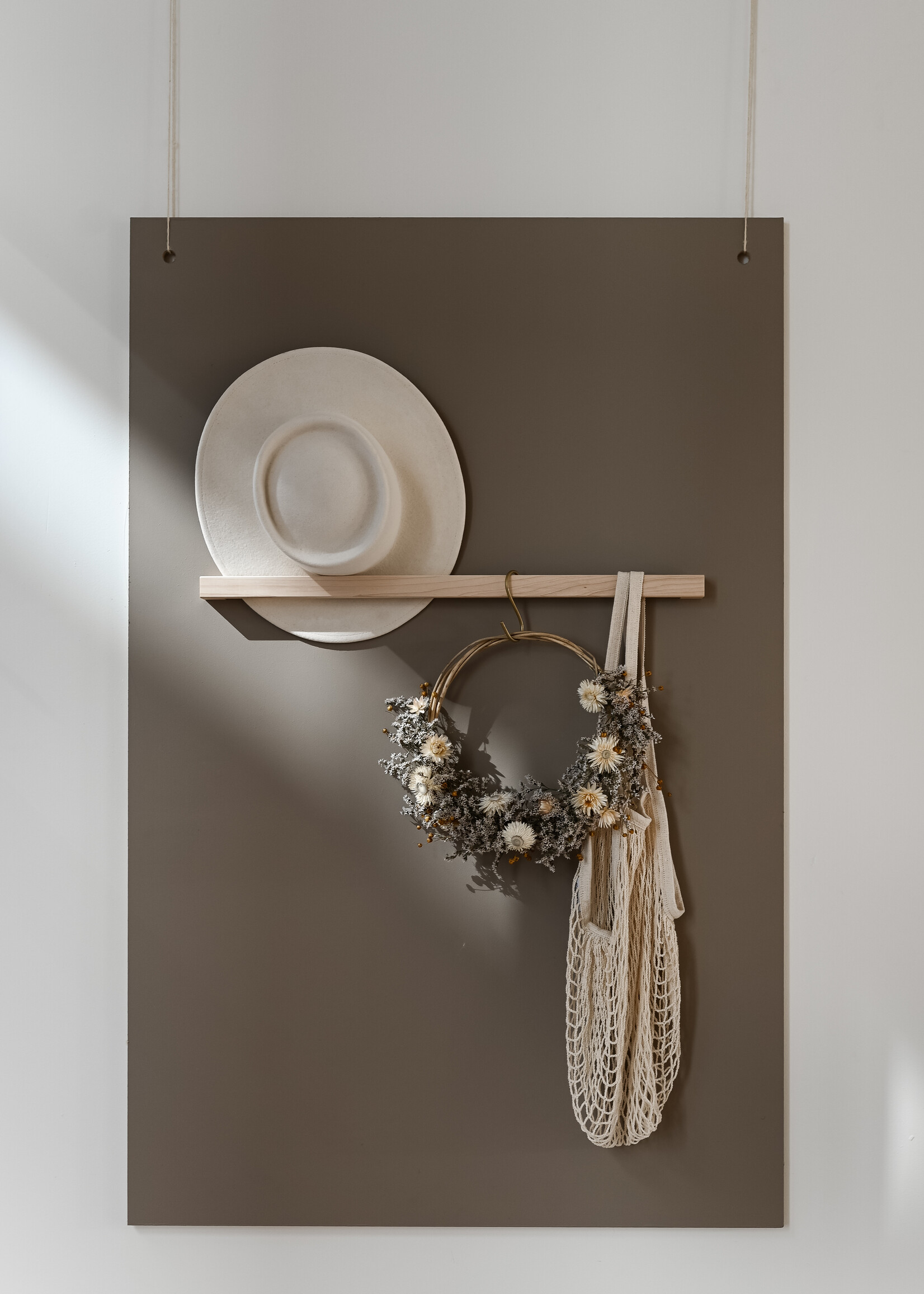 Light-colored flower wreath with dried flowers