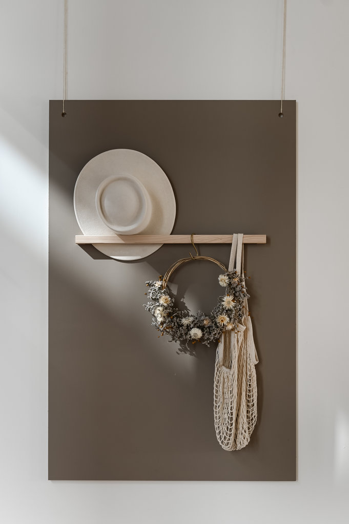 Light-colored flower wreath with dried flowers