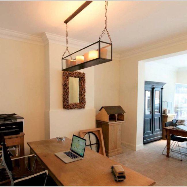 Suspension en bronze avec bougies LED dynamiques