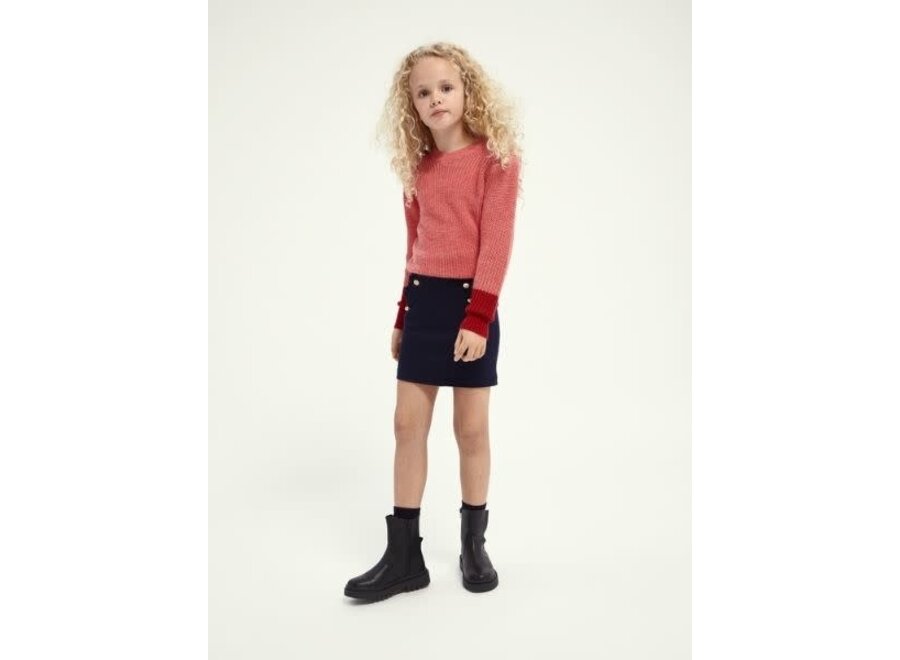 Classic clean jersey skirt with shell buttons