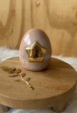 Urn roze met gouden ster