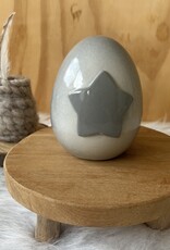 Urn met grijze ster