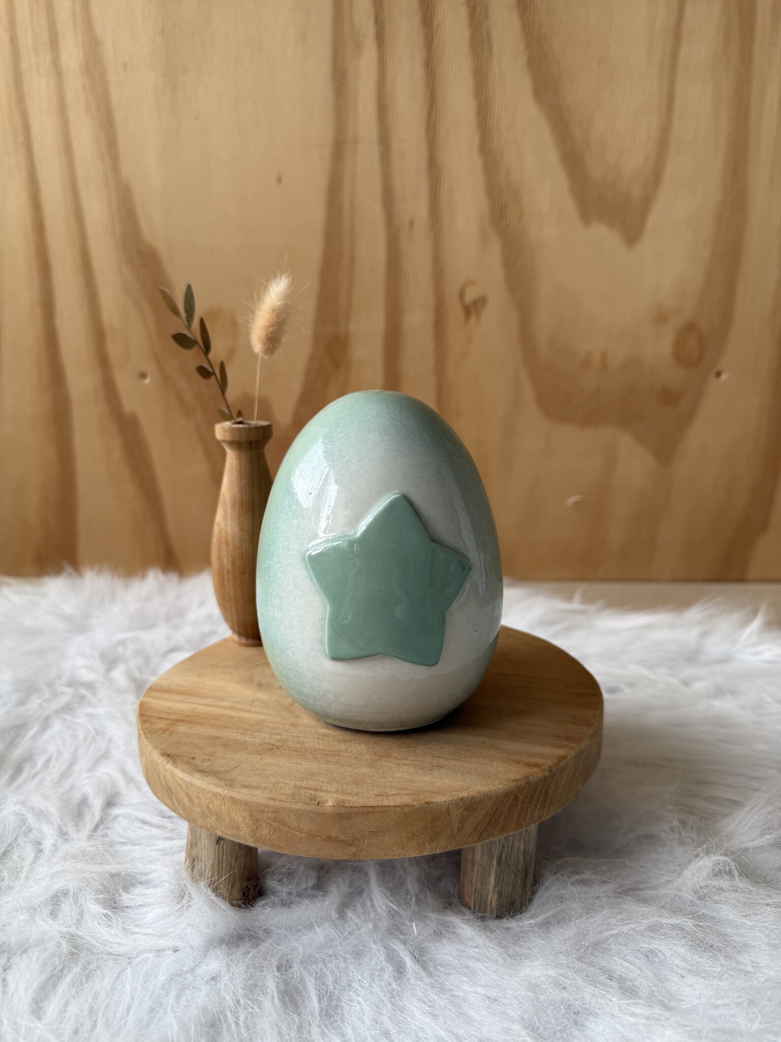 Urn met mintgroene ster