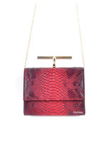 Tas  rood met messing beugel met een kroko motief.