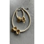 Rian Rian Parel ketting  met goud strikje