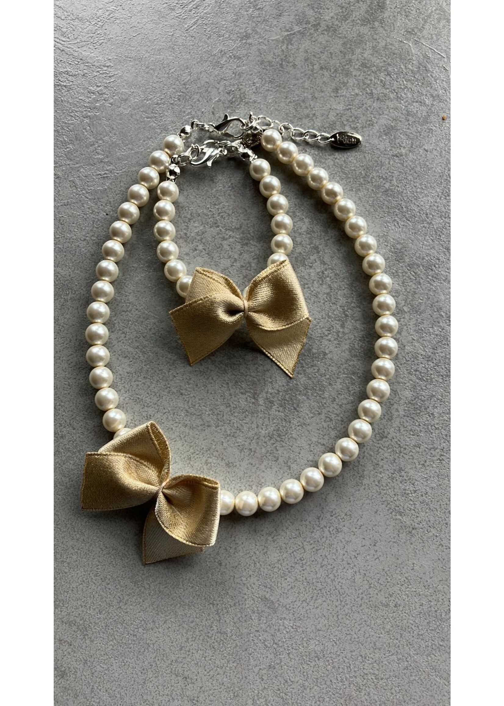 Rian Rian Parel ketting  met goud strikje