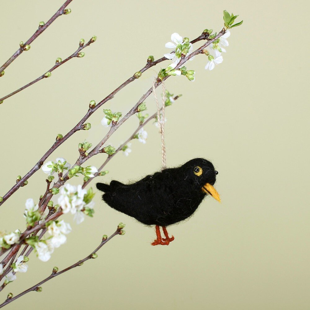 Sjaal met verhaal Sjaal met verhaal - hanger vogel - merel