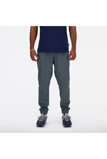 New Balance Pant Woven Grijs Heren