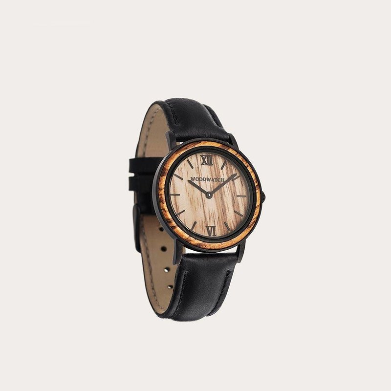 A combination of unique materials with a minimal design to create a timeless look. Each design features a combination beautifully grained wood and genuine leather straps. Inspired by todays women around the world, the globetrotter, the traveller, the entr