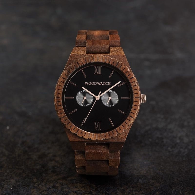 This premium designed watch combines natural wood type with a luxurious stainless steel dial and backplate. At the heart of the timepiece is a multi-function movement with two subdials featuring a week and month display. The GRAND Dark Orion is made of Ac