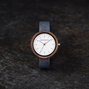 Inspired by contemporary Nordic minimalism. The NORDIC Stockholm Navy features a 36mm diameter walnut case with a white dial and silver details. Handmade from sustainably sourced wood combined with an ultra soft navy blue sustainable vegan leather strap.