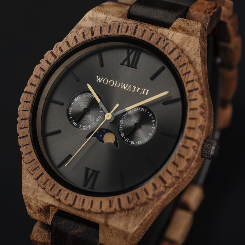 This premium designed watch with moon phase, combines unique new wood types with a luxurious stainless steel dial and backplate. At the heart of the timepiece comes an all new multi-function movement that includes two extra subdials featuring a week and m