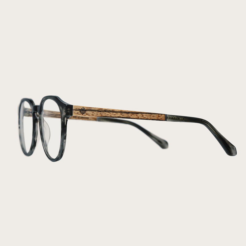 Filter out harmful excess blue light which can cause eye strain, headaches and poor sleep. The REVELER Heritage features a sleek geometric grey tortoise frame and is composed of durable Italian Mazzucchelli bio-acetate with hand-finished natural zebrawood