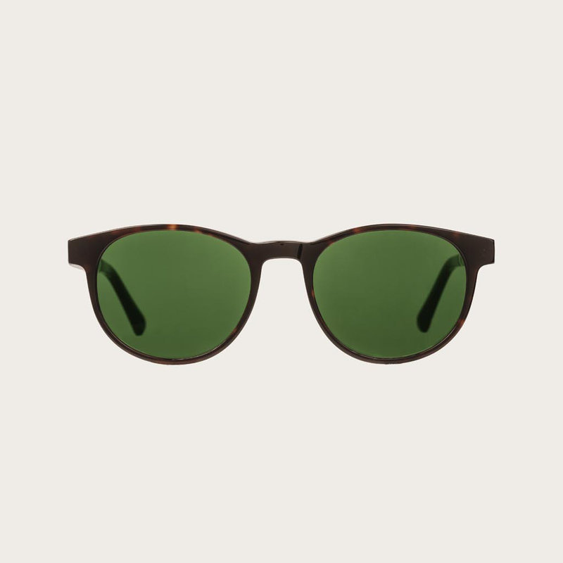 ELLIPSE Forever Havanas Camo presenta un redondo y característico marco de tortuga marrón oscuro con cristales verde camuflaje. Compuesto de un duradero bio acetato italiano Mazzucchelli con acabado a mano natural varillas de ébano y terminales de acetato