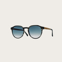 La paire de lunettes le REVELER Heritage Gradient Blue poséde un cadre élégant en écaille gris avec des verres en bleu dégradé. Fabriquée à partir de bois durable et du bioacétate Mazzuchelli Italien avec des branches de bois zèbre naturel et des manchons