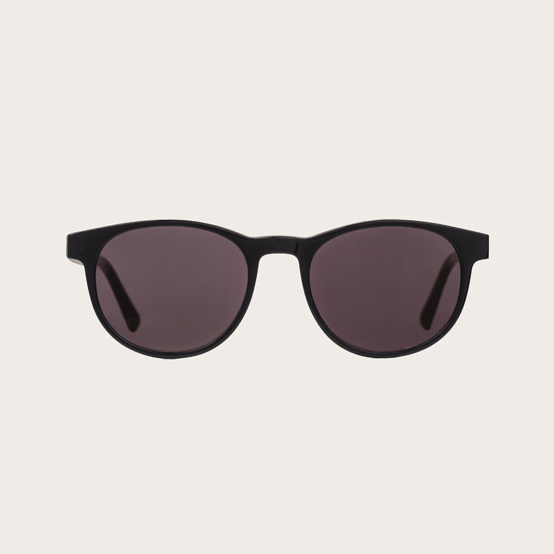 La paire de lunettes l’ELLIPSE All Black poséde un cadre rond en noir avec des verres en noir. Fabriquée à partir de bois durable et du bioacétate Mazzuchelli Italien avec des branches et écaille de tortue en bois de rose et des manchons en acétate noir.