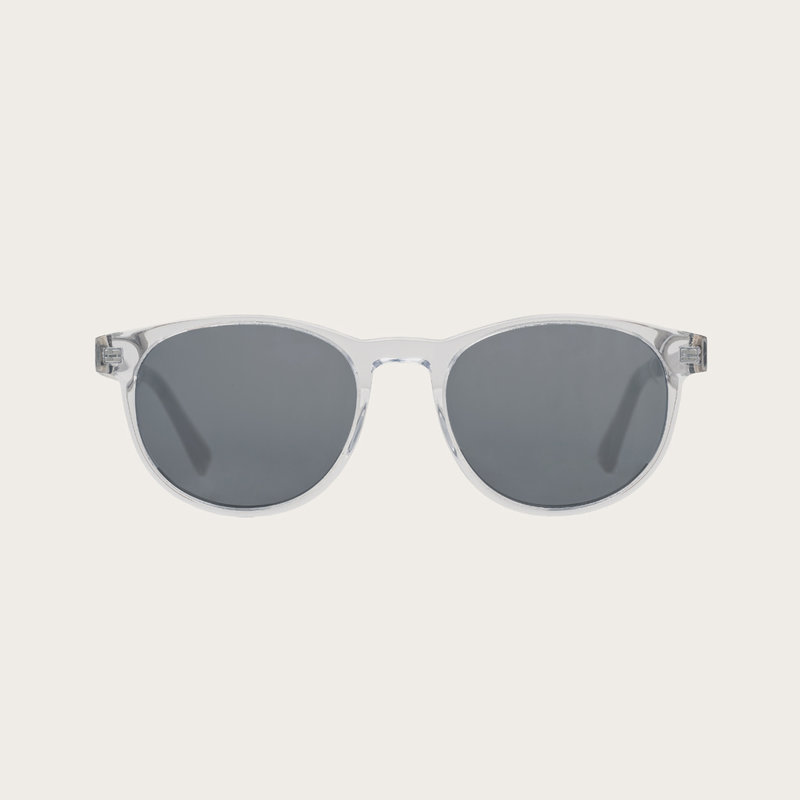 The ELLIPSE Clear Smoke features a characteristic rounded clear frame with grey smoke lenses Composed of durable Italian Mazzucchelli bio-acetate with hand-finished natural senna siamea wood temples and nude acetate tips. Bio-acetate is made from cotton a