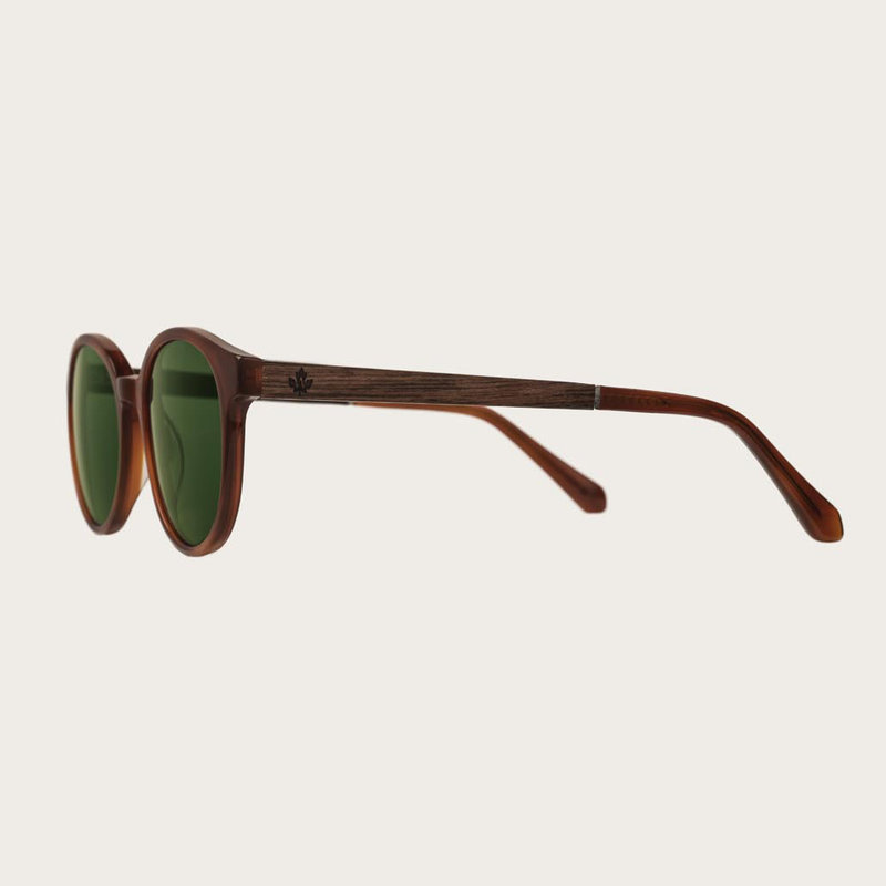 SOHO Classic Havanas Camo sfoggia linee ovali tartarugata giallo scuro geometrica con stanghette verde militare  lenti scure. In resistente bio-acetato italiano firmato Mazzucchelli con stanghette in palissandro naturale in ebano e tartaruga terminali ner