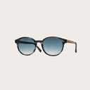 The SOHO Heritage Gradient Blue features an oval grey tortoise frame with gradient blue lenses. Composed of durable Italian Mazzucchelli bio-acetate with hand-finished natural zebrawood temples and tortoise acetate tips. Bio-acetate is made from cotton an